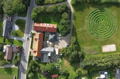 an aerial view of a house with a spiral garden at Room 8 - Hawkraft kulturhotel in Vestervig