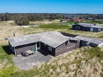 an overhead view of a house with solar panels on it at Holiday Home Mira - 375m from the sea by Interhome in Løkken