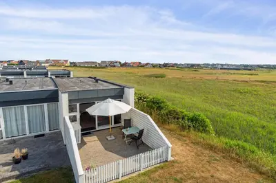 an aerial view of a house with an umbrella at Agger Holidays in Vestervig