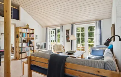 a living room with a couch and a table at Stunning Home In Fur With Wifi in Fur