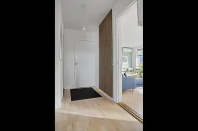 a hallway with a door leading to a living room at Apartment in central Holstebro in Holstebro