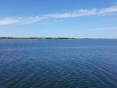 a large body of water with a blue sky at 4 person holiday home in Thisted-By Traum in Thisted