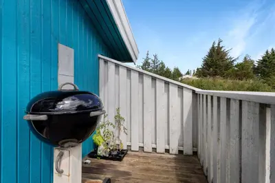 a grill hanging on the side of a building at Skytten 5 - Environmentally Friendly Holiday Home in Hune