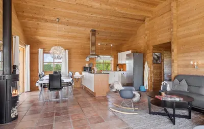 a kitchen and living room with a table and chairs at Stunning Home In Vinderup With Kitchen in Vinderup