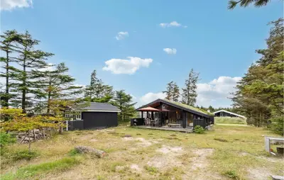 a house in the middle of a field at Awesome Home In Saltum With Wifi in Saltum