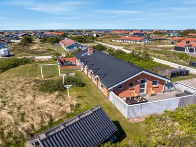 an aerial view of a house in a suburb at Holiday Home Jenvold - 600m from the sea by Interhome in Torsted
