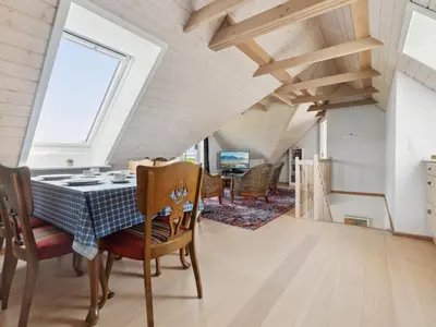 a dining room with a table and chairs at Apartment Dietlinde - 1-3km to the fjord by Interhome in Thyholm