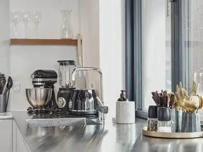 a kitchen counter with a blender on a counter top at Holiday Home Bena - 800m from the sea by Interhome in Blokhus