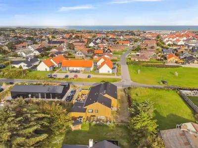 an aerial view of a suburb with houses at Holiday Home Bena - 800m from the sea by Interhome in Blokhus