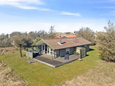 an aerial view of a house with a deck at Holiday Home Tianna - 500m from the sea by Interhome in Pandrup