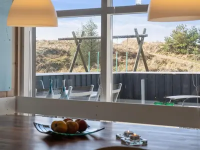a bowl of fruit on a table in a room at Holiday Home Franzisca - 700m from the sea by Interhome in Saltum