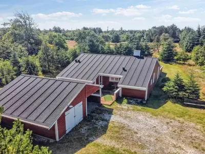 an aerial view of a home with a metal roof at Holiday Home Valda - 1-5km from the sea by Interhome in Saltum