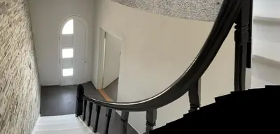a spiral staircase in a building with a window at Apartment Vanilla - 2 rooms and one bathroom in Struer