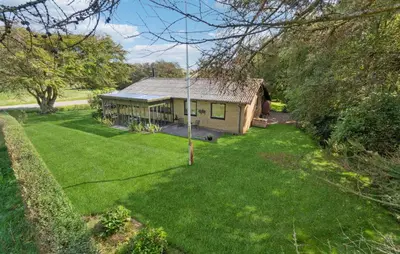 an aerial view of a house with a yard at Awesome Home In Nykøbing M in Hesselbjerg