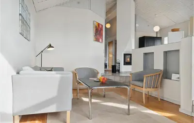 a living room with a table and chairs at Pet Friendly Home In Thisted With Wifi in Thisted
