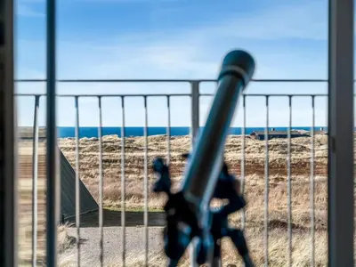 a baseball bat in front of a fence at Holiday Home Pauli - 350m from the sea by Interhome in Pandrup