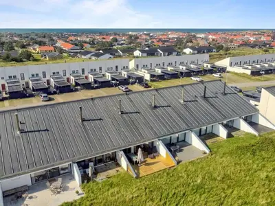 an overhead view of a building with a roof at Apartment Virpi - 1km from the sea by Interhome in Blokhus