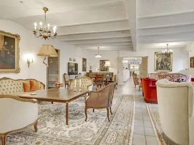 a living room with a table and chairs at 5 star holiday home in Spøttrup-By Traum in Spottrup