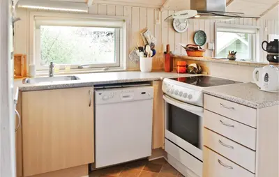 a kitchen with a sink and a dishwasher at Nice Home In Vinderup With Kitchen in Vinderup