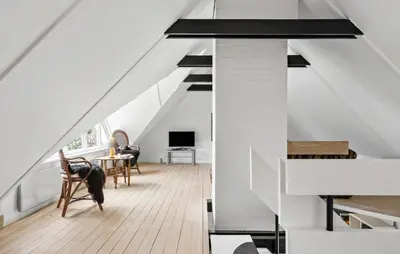 a room with a staircase with a table and chairs at Stunning Home In Hurup Thy With Wifi in Boddum