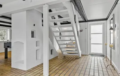 a white staircase in a room with white walls at Stunning Home In Hurup Thy With Wifi in Boddum