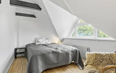 a white bedroom with a bed and a window at Stunning Home In Hurup Thy With Wifi in Boddum