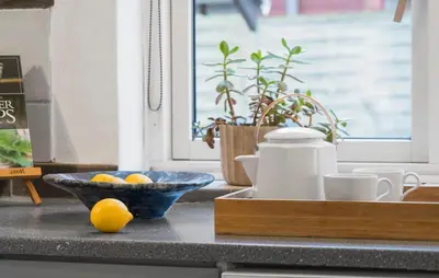 a bowl of oranges sitting on a kitchen counter at 2 Bedroom Awesome Home In Vestervig in Vestervig