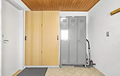an empty room with a closet and a locker at 3 Bedroom Pet Friendly Home In Ulfborg in Ulfborg