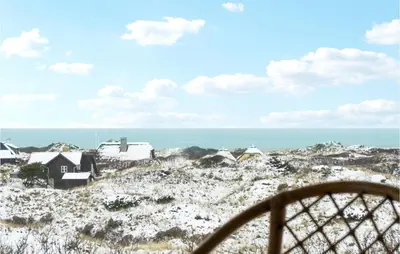 a view of a beach with houses and the ocean at Awesome Home In Saltum With Kitchen in Saltum