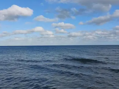 a large body of water with a cloudy sky at 12 person holiday home in Roslev-By Traum in Roslev