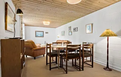 a dining room with a table and chairs at 4 Bedroom Lovely Home In Ranum in Ranum