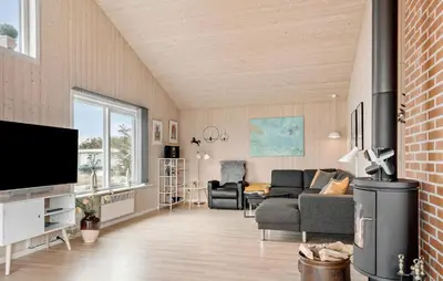 a living room with a couch and a tv at Lovely Home In Thisted With Kitchen in Thisted