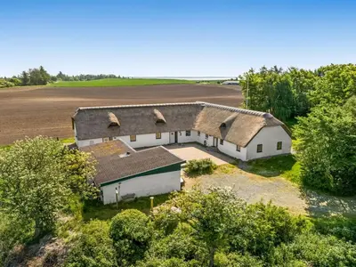 an aerial view of a barn in a field at Holiday Home Annli - 800m to the fjord by Interhome in Fur