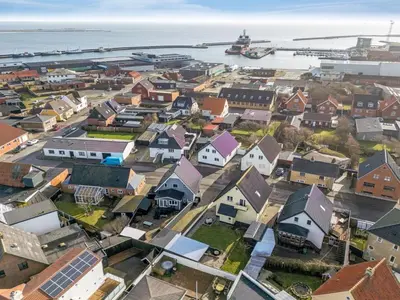 an aerial view of a small town next to the ocean at Holiday Home Ullakarin - 200m from the sea by Interhome in Thyborøn