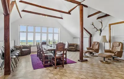 a dining room with a table and chairs at Pet Friendly Apartment In Vestervig in Vestervig