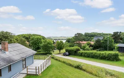 an aerial view of a house with a yard at 3 Bedroom Stunning Home In Hurup Thy in Doverodde