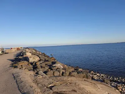 a group of rocks on the shore of a body of water at 5 person holiday home in Vesløs-By Traum in Øsløs