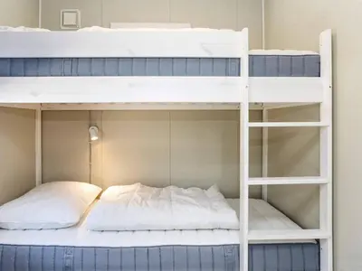 a bunk bed room with two bunk beds at 5 star holiday home in Øster Assels-By Traum in Øster Assels