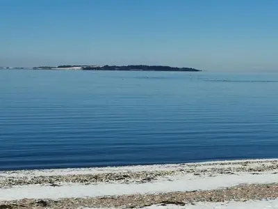 an island in the middle of a large body of water at 4 star holiday home in Løgstør-By Traum in Løgsted