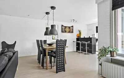 a kitchen and dining room with a table and chairs at Lovely Home In Vestervig With Kitchen in Vestervig