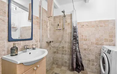 a bathroom with a sink and a shower at 2 Bedroom Gorgeous Home In Saltum in Saltum