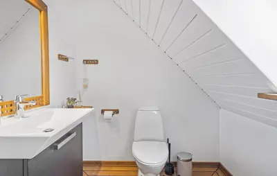 a bathroom with a white sink and a toilet at Pet Friendly Home In Lemvig With Wifi in Lemvig
