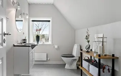 a bathroom with a toilet and a sink and a window at Stunning Home In Spøttrup With Wifi in Spottrup