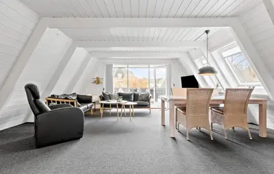 a living room with a table and chairs at Awesome Home In Farsø With Wifi in Farsø