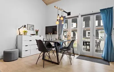 a dining room with a table and chairs at Amazing Apartment In Vestervig in Vestervig