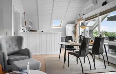 a dining room with a table and chairs at Cozy Home In Vestervig With Wifi in Vestervig