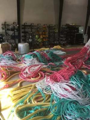 a pile of different colored ropes on a table at Nyd den skønne natur ved hav og fjord in Thyborøn
