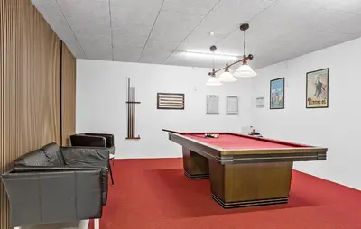 a billiard room with a pool table and chairs at Stunning Home In Roslev With Kitchen in Roslev