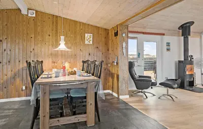 a dining room with a table and some chairs at Gorgeous Home In Thisted in Thisted