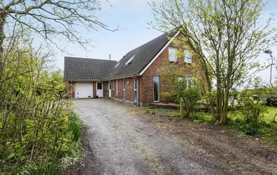 a house with a dirt road in front of it at 3 Bedroom Beautiful Home In Vesløs in Vesløs